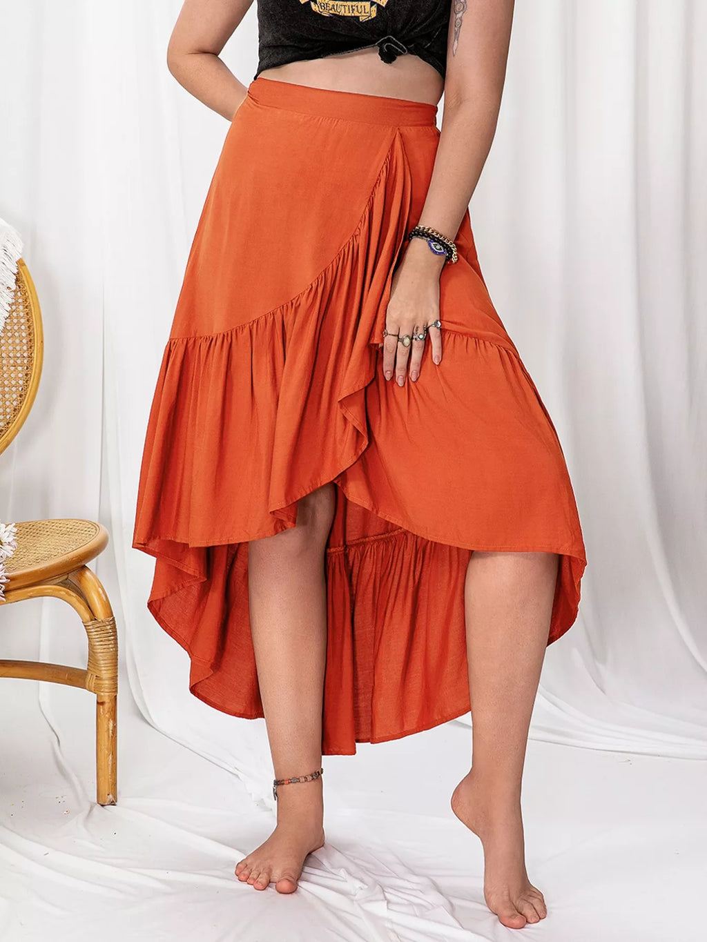 Orange ruffled high low skirt full length styled look
