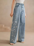 Embroidered wide leg jeans in blue front view