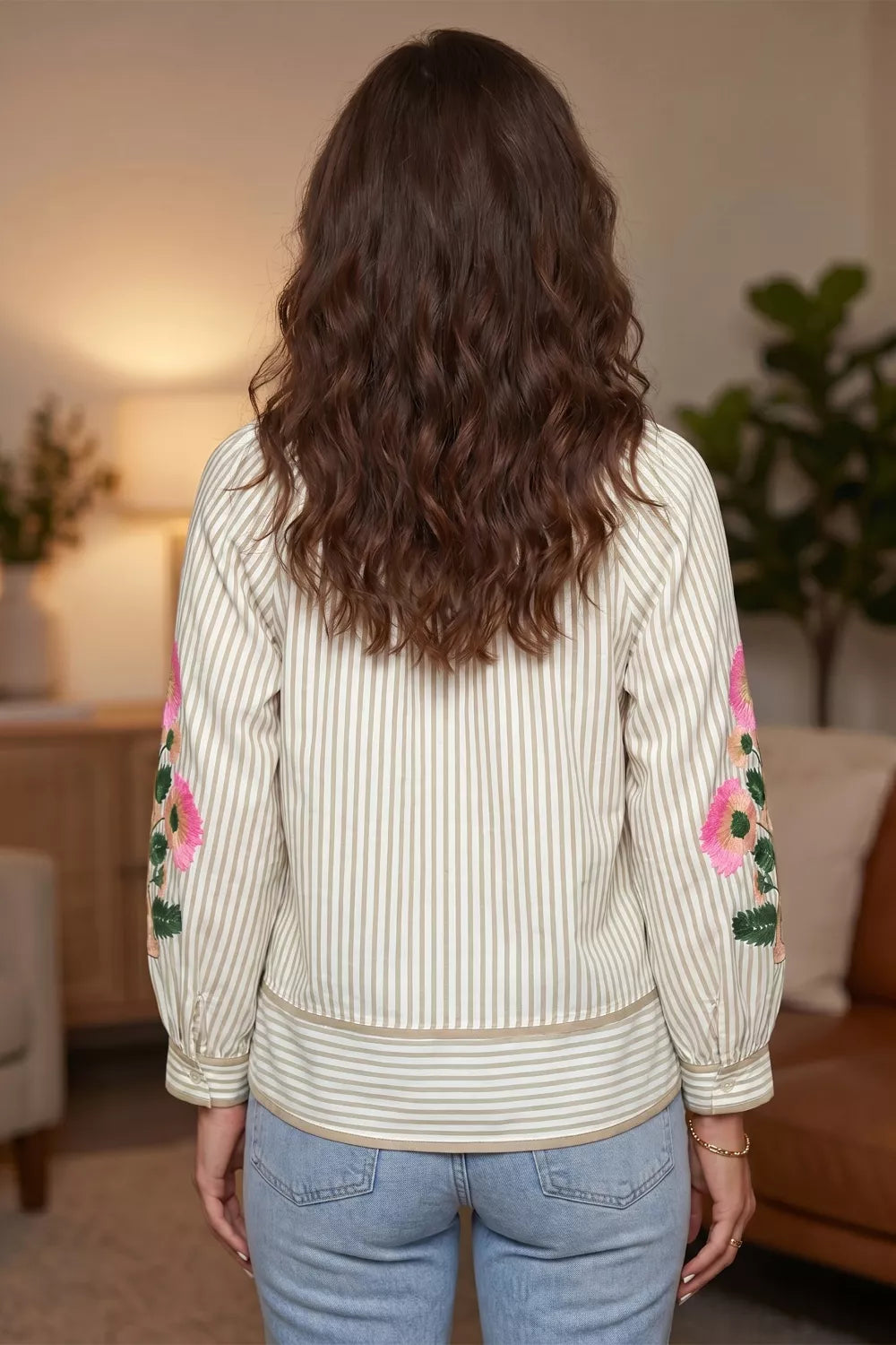 Beige striped floral embroidered blouse on model