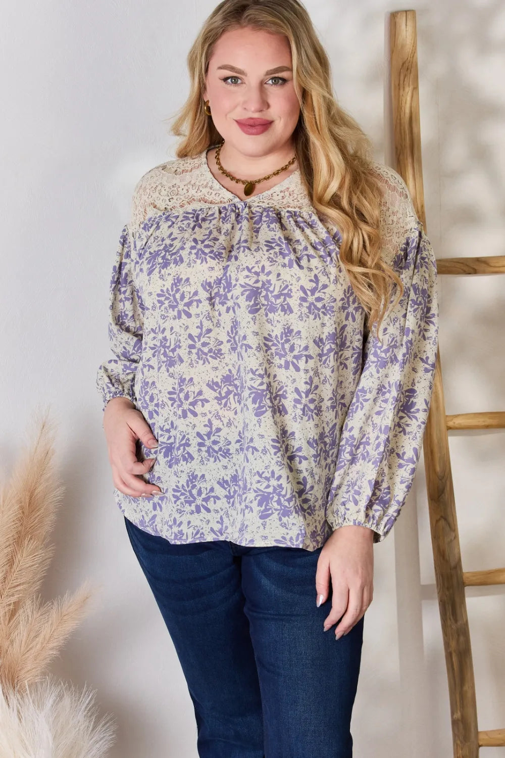 Lace printed blouse neckline detail
