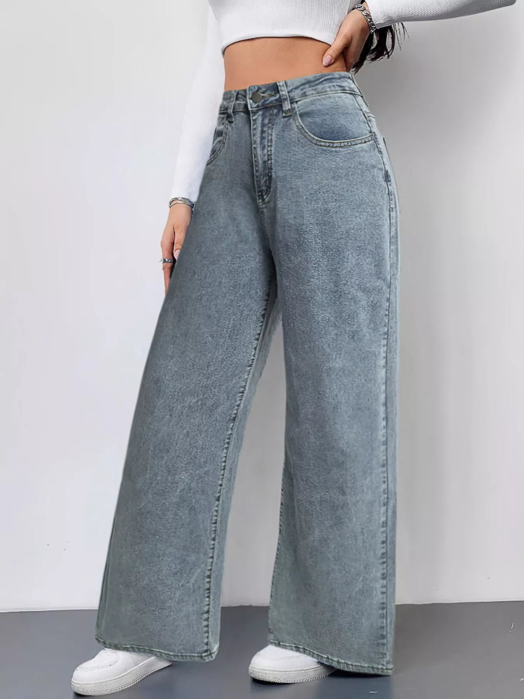 Light blue wide leg jeans back view