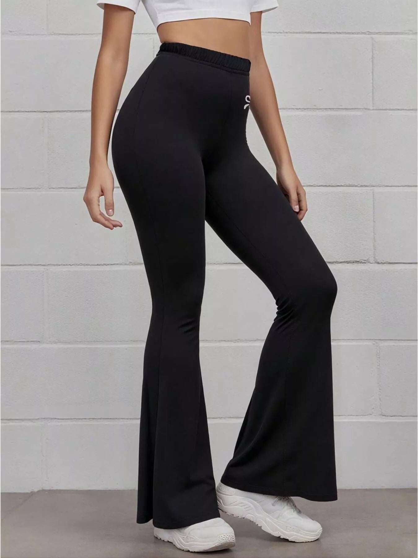 Black high waist active pants side profile