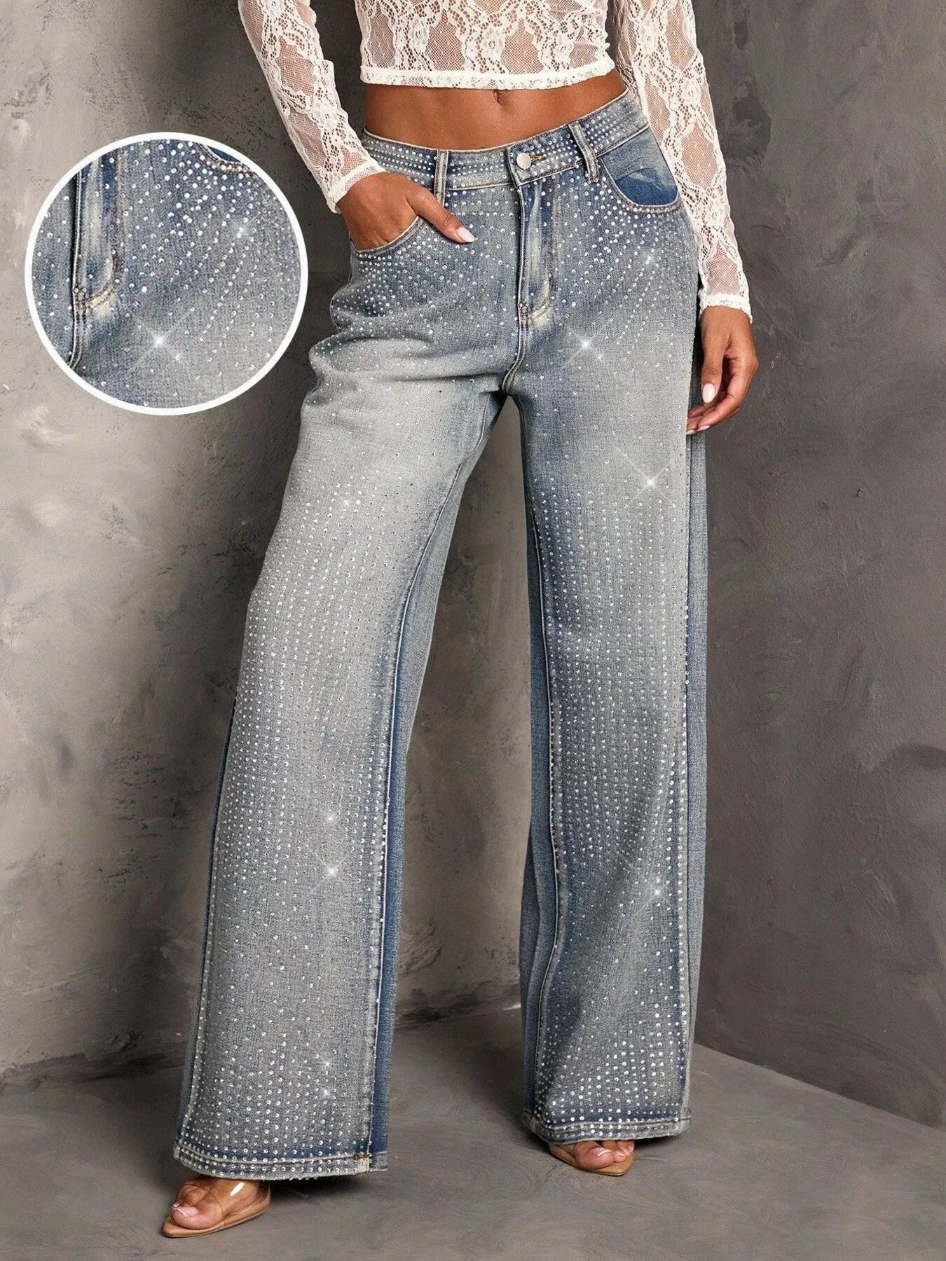 Woman wearing rhinestone wide leg jeans