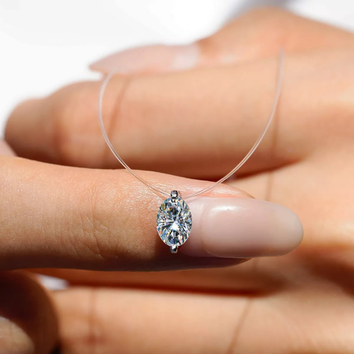 Silver pendant necklace on delicate chain