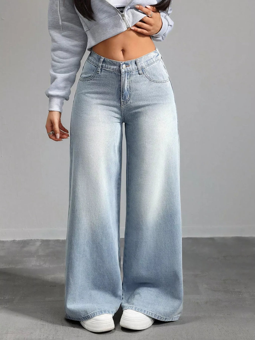 High waisted wide leg jeans in soft light blue front view