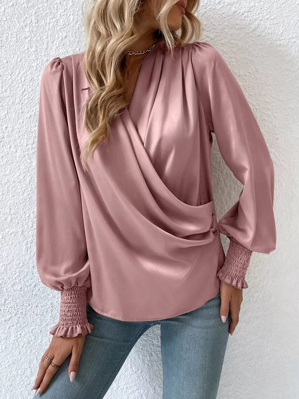 Smocked blouse sleeve cuff detail