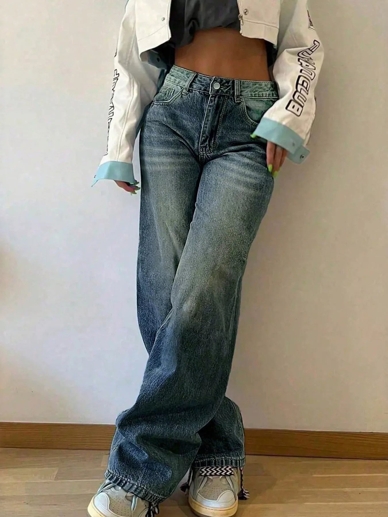 Blue vintage wash wide leg jeans front view on model
