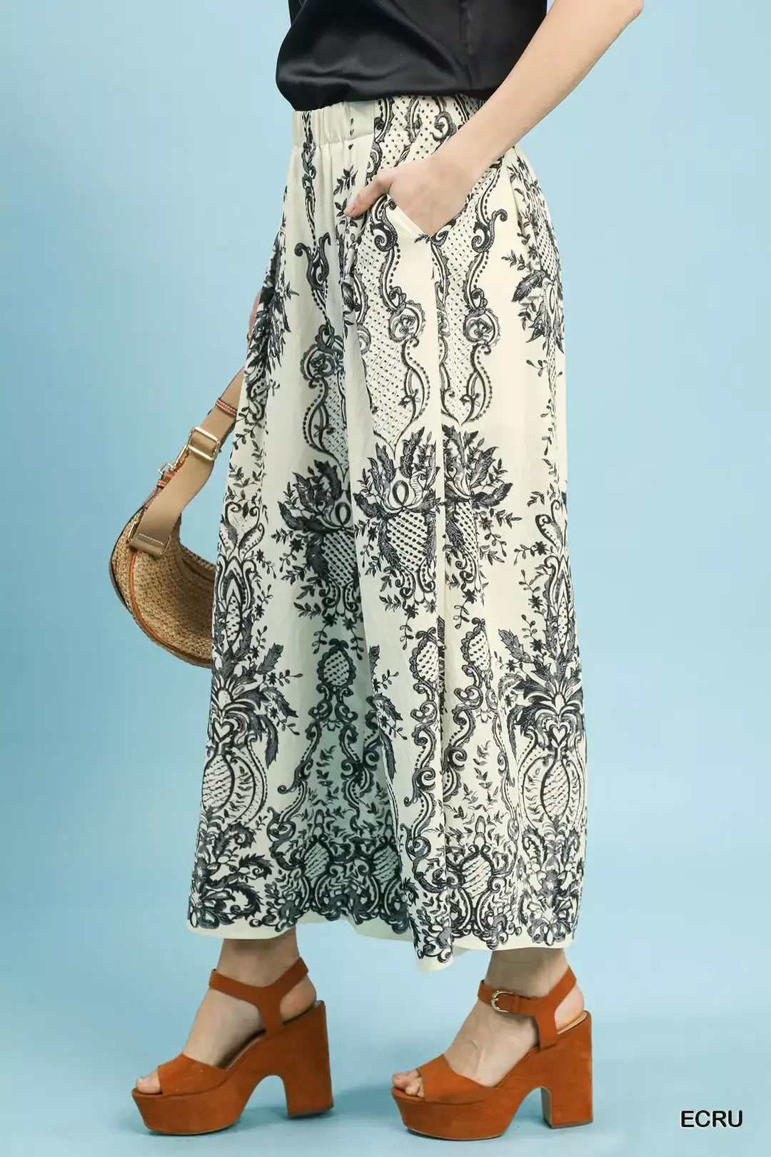 Border print wide leg pants on model