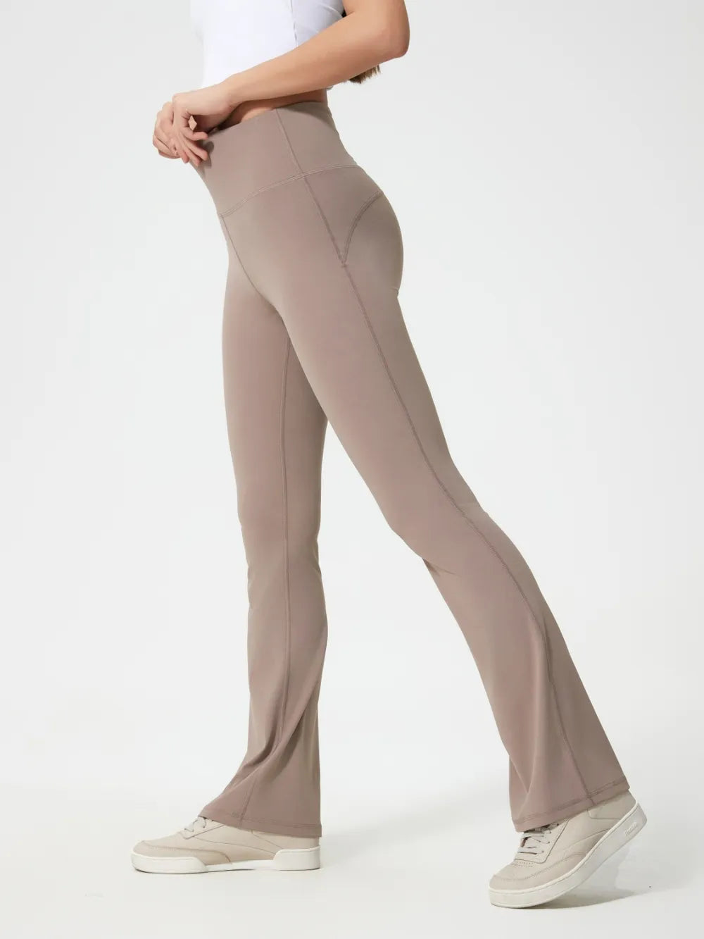 Dark gray active pants side view on model