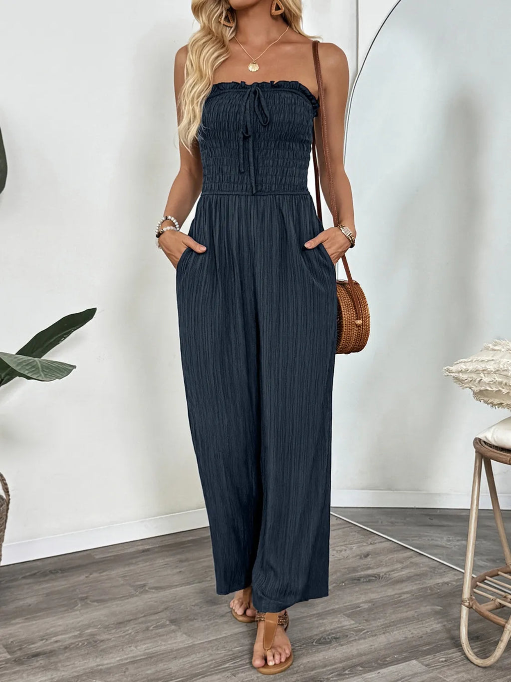 Dark blue smocked tube wide leg jumpsuit front view