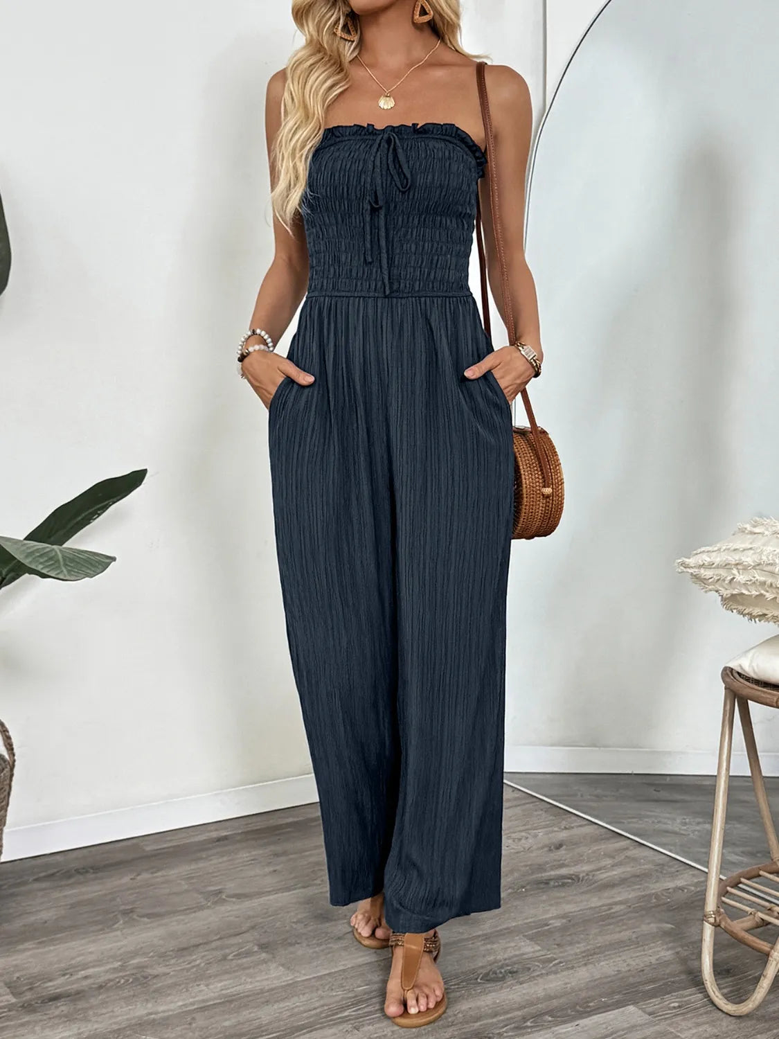 Dark blue smocked tube wide leg jumpsuit front view