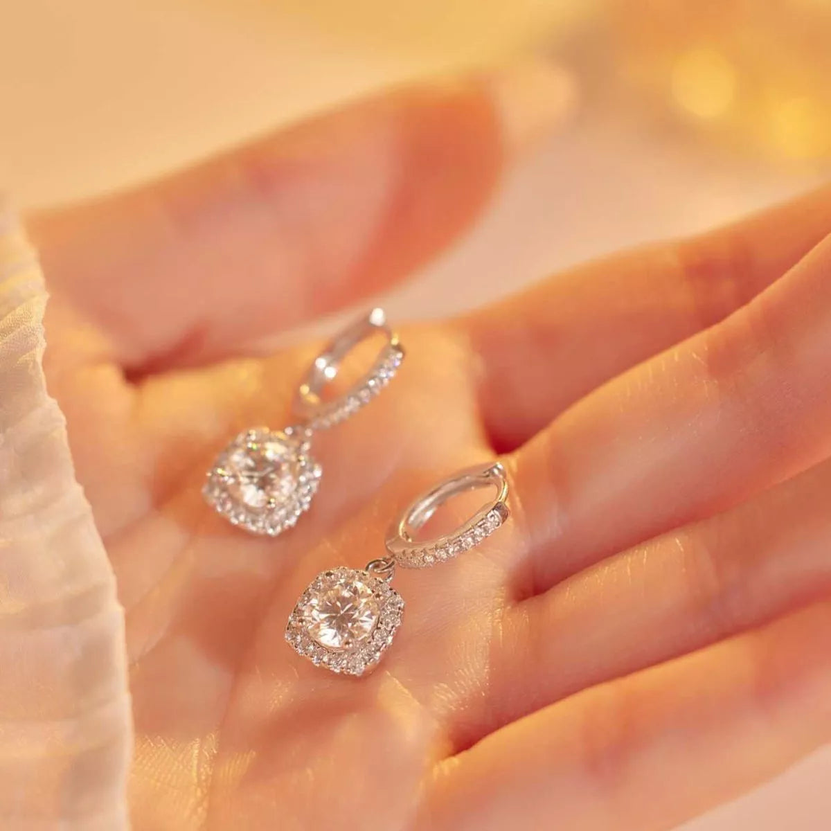 Silver moissanite drop earrings pair view