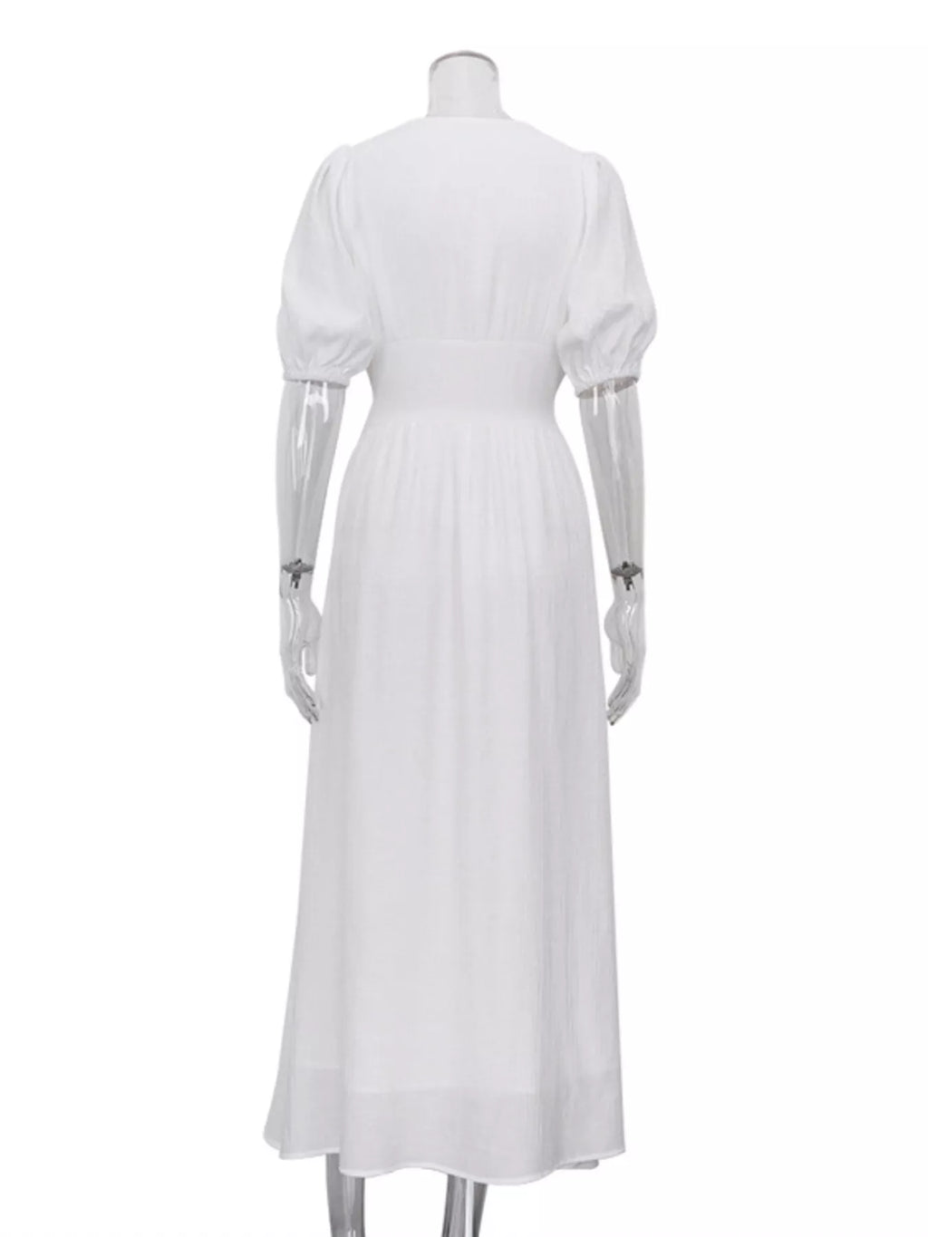 Model wearing white puff sleeve maxi dress