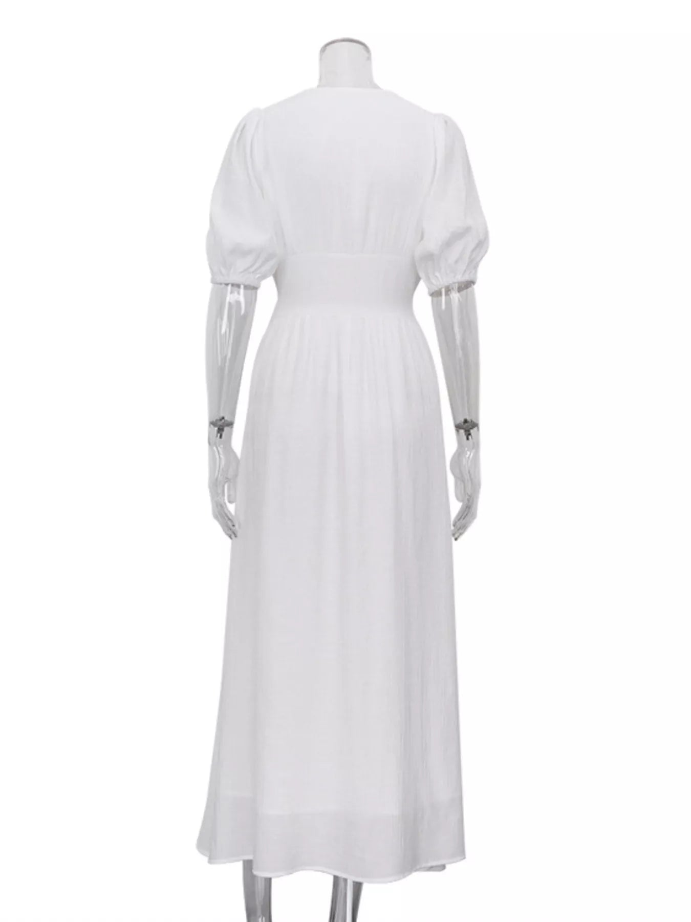 Model wearing white puff sleeve maxi dress