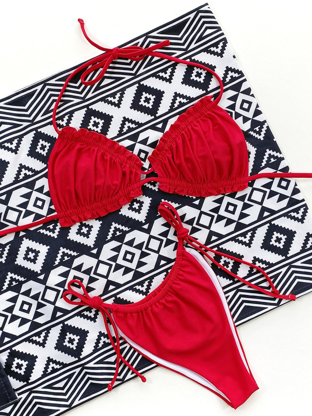 Red halter neck bikini set on model