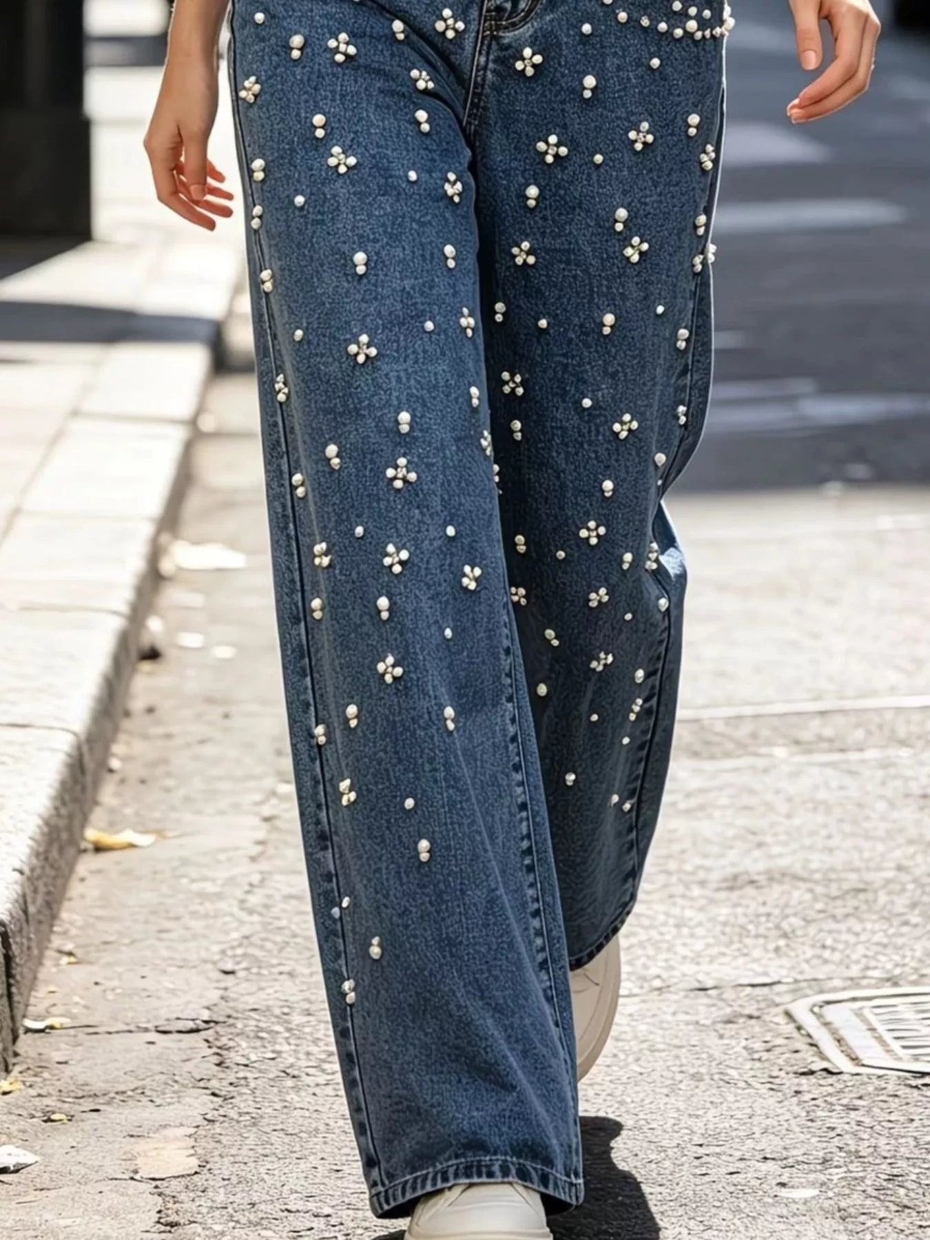 Rhinestone embellished jeans pocket detail