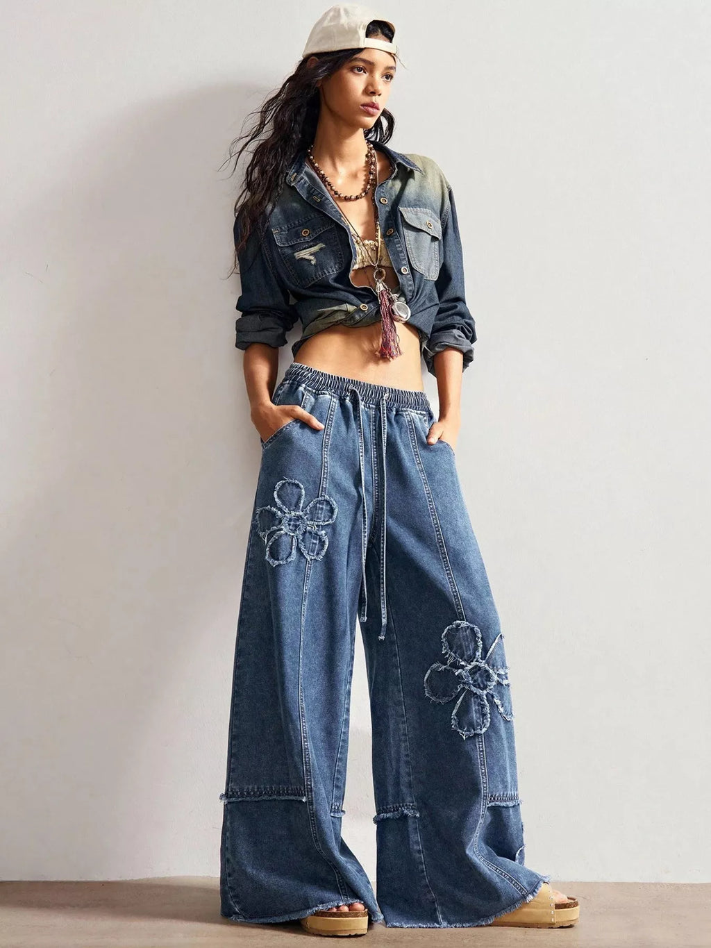 Floral applique wide leg jeans side view