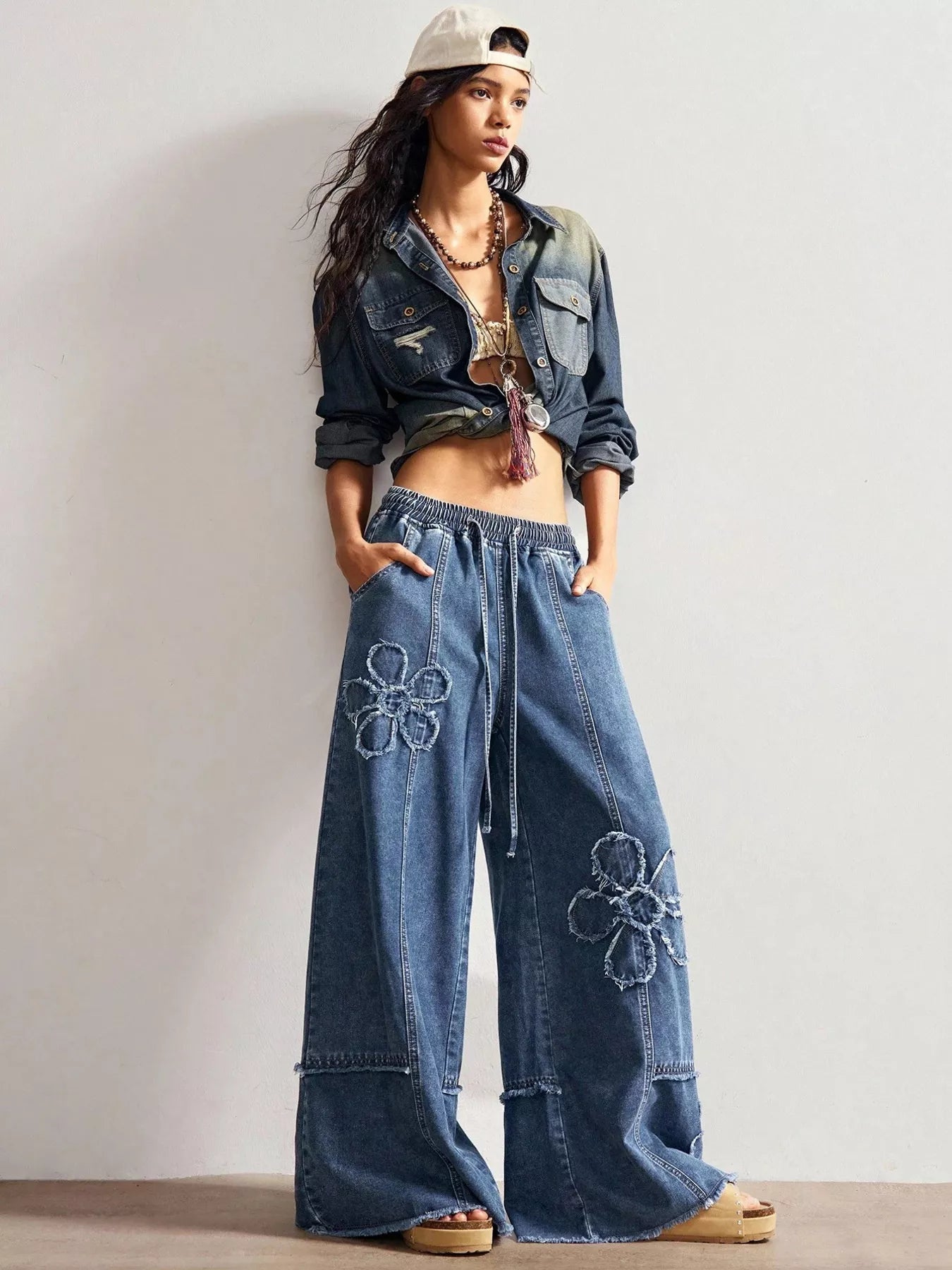 Floral applique wide leg jeans side view