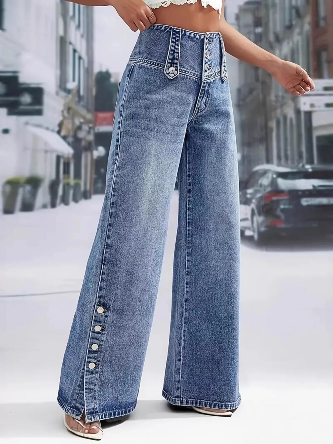 Blue high waist button detail wide leg jeans front view on model
