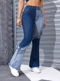 Blue two tone frayed hem flare jeans front view on model