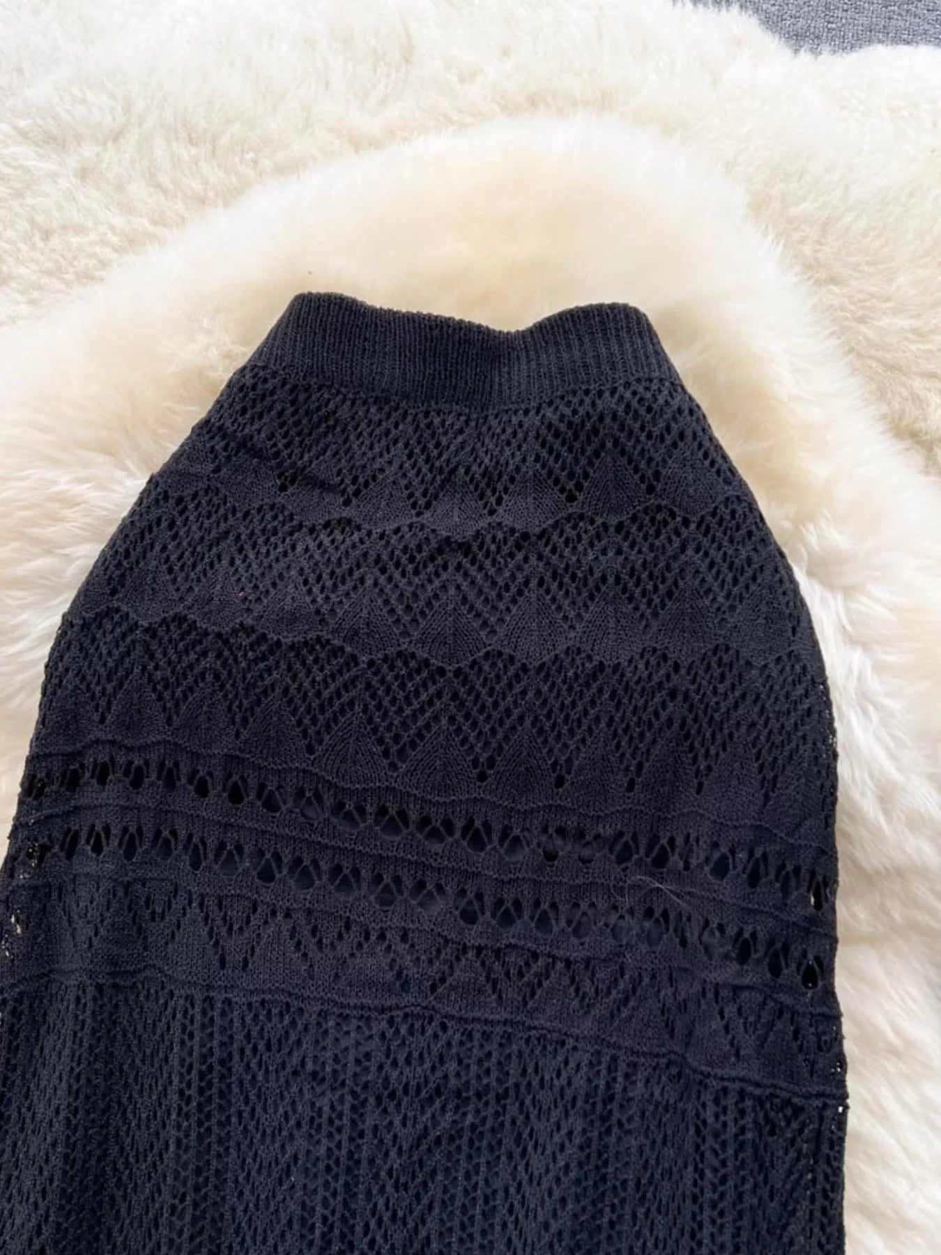 Hollow out knitted maxi skirt styled as beach cover up