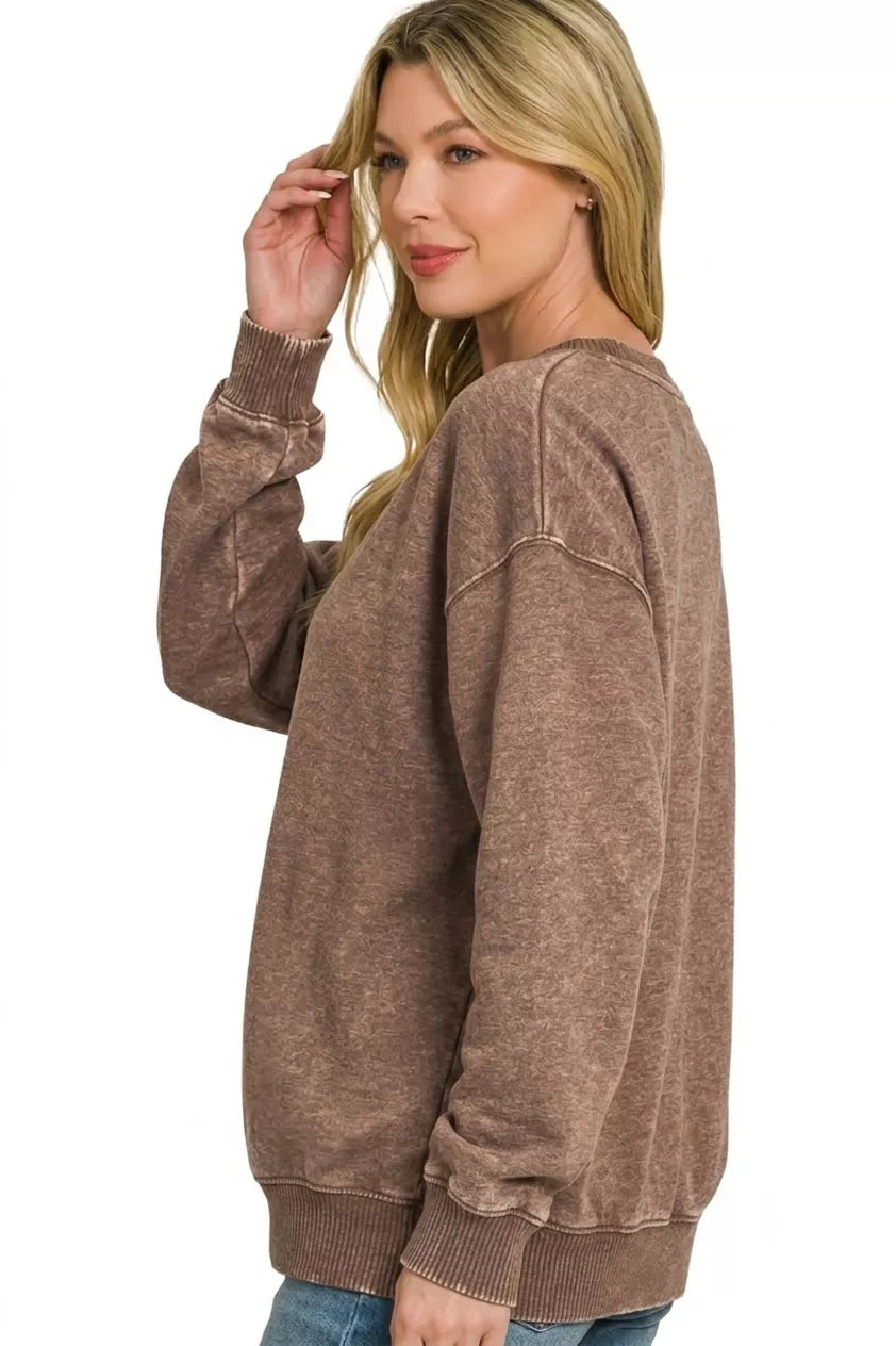 Detail of brown fleece sweatshirt vintage acid wash texture