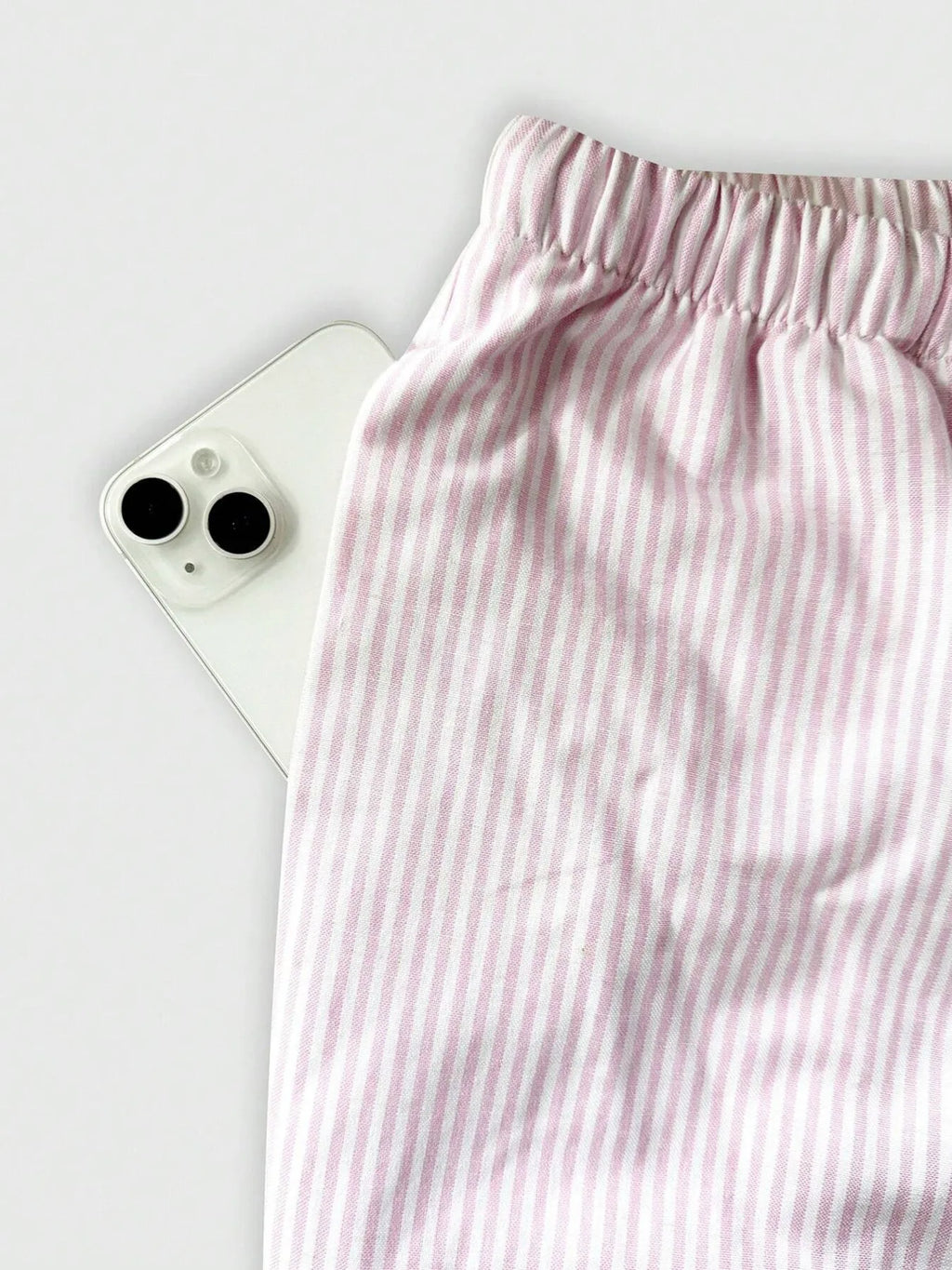 Dark pink striped pants side view