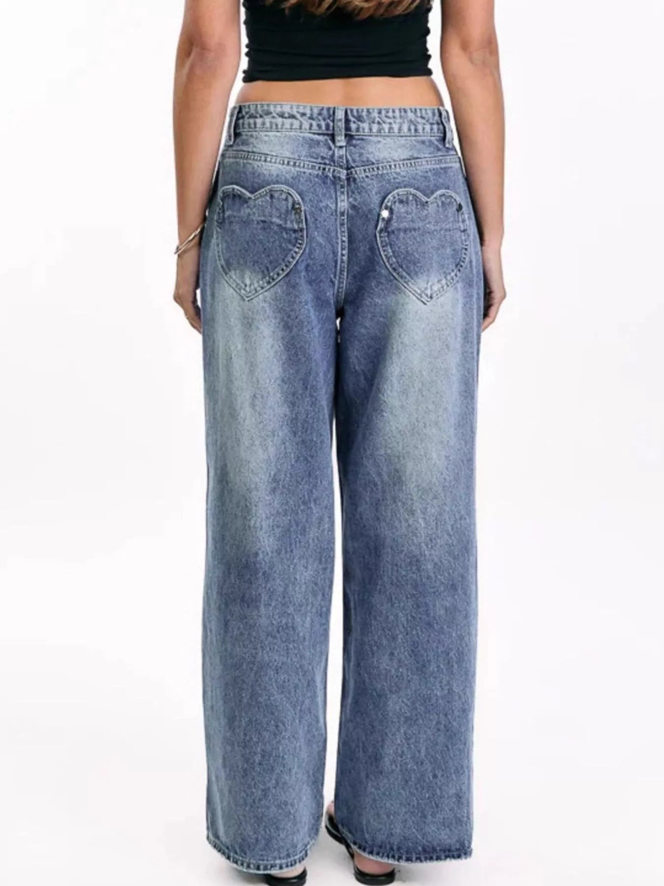 Pocketed wide leg jeans fabric and hem detail