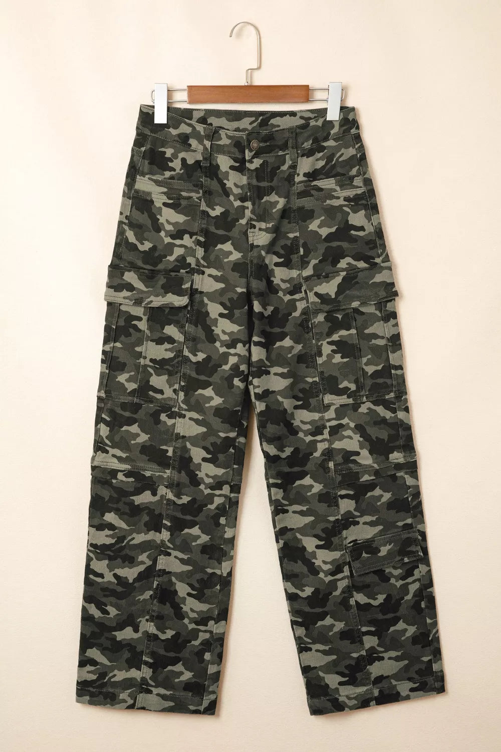 Cargo pocket detail on camouflage denim pants
