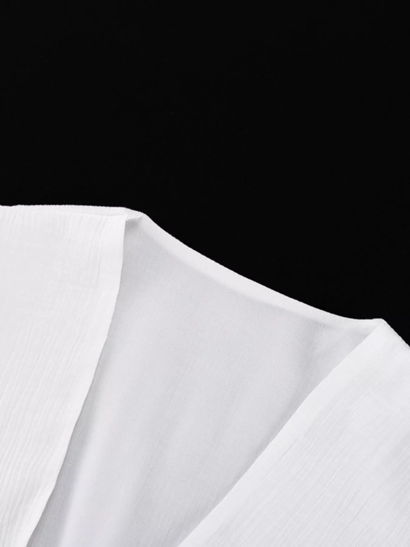 White maxi dress front slit close up