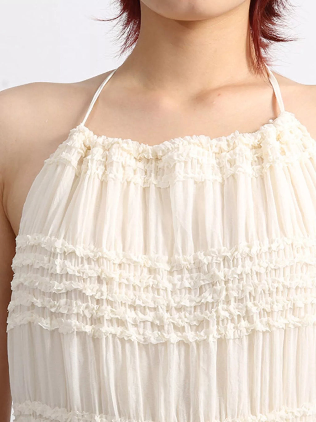 Halter neck ruched dress styled for evening