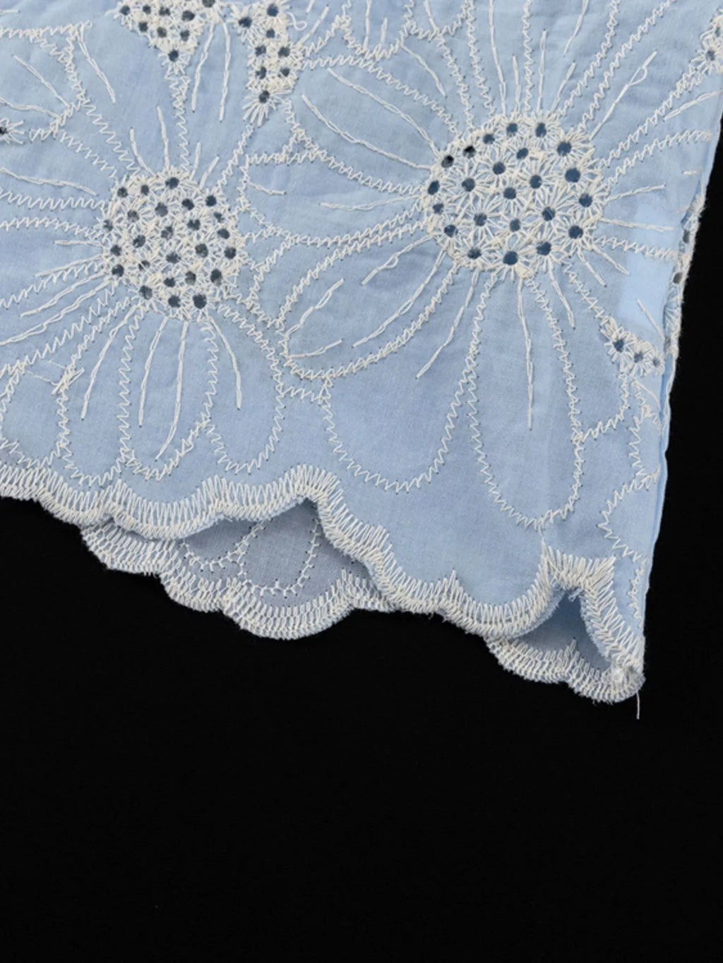 Embroidered blouse model side pose