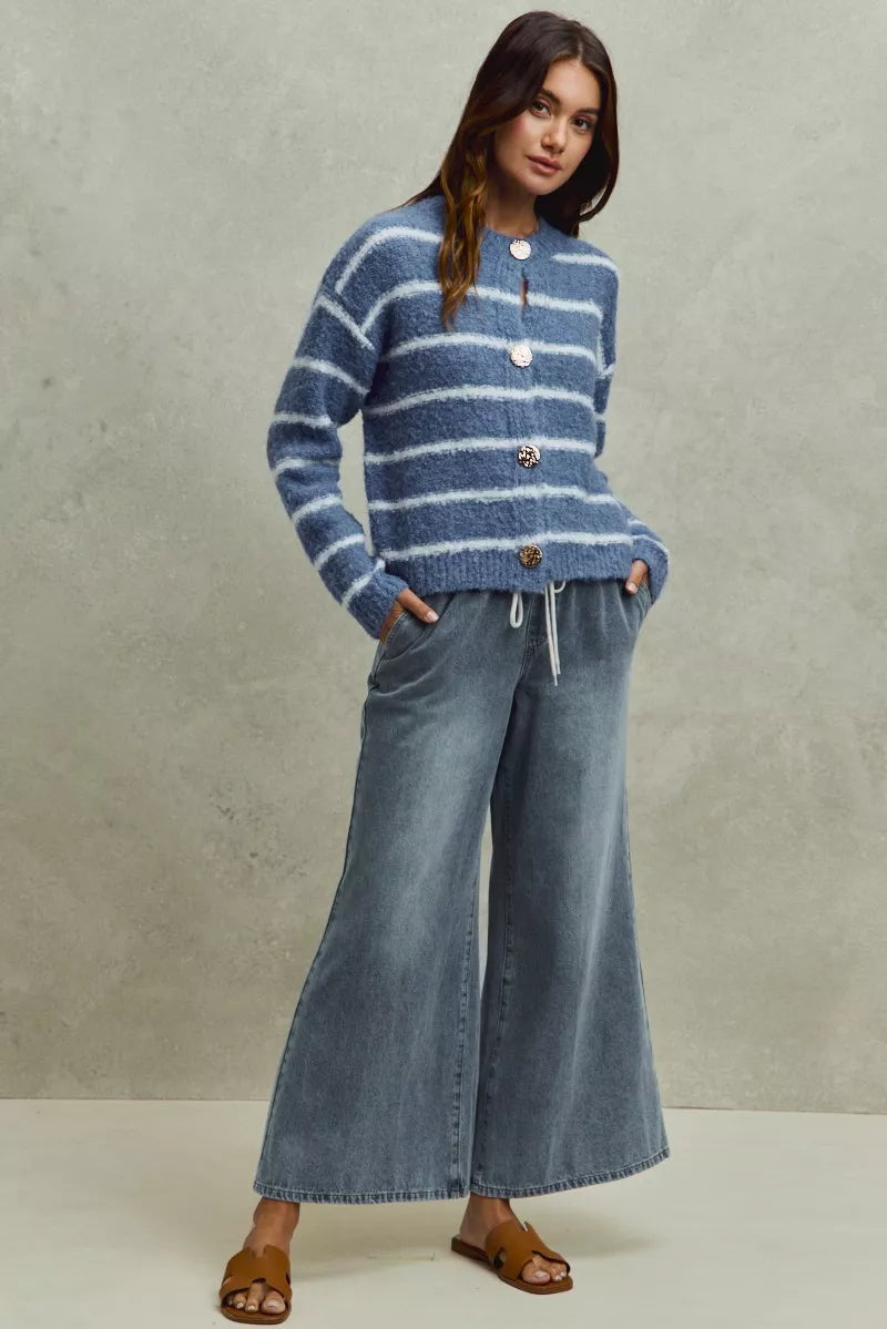 Mid rise flare jeans styled on model