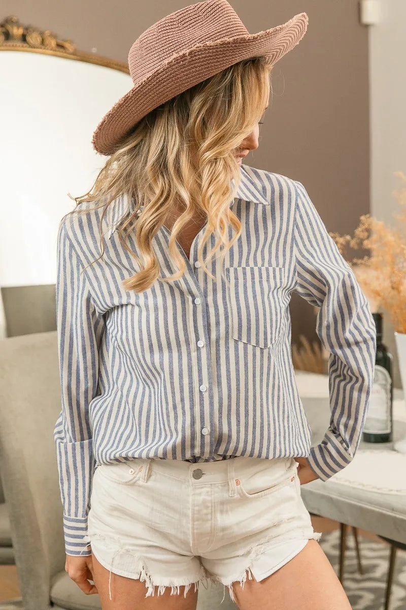 Collar and button detail on striped shirt