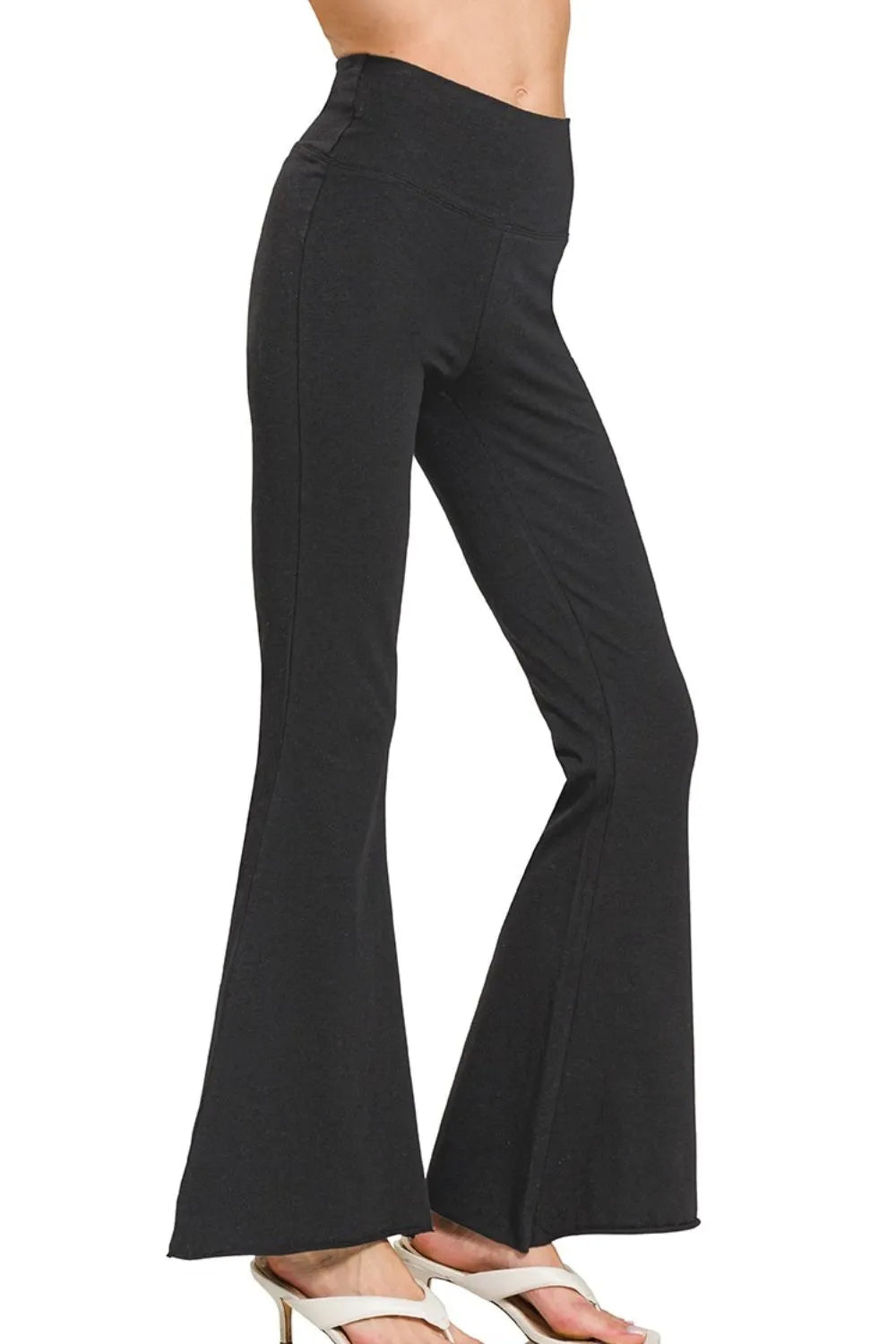 Side view of black bootcut flare yoga pants