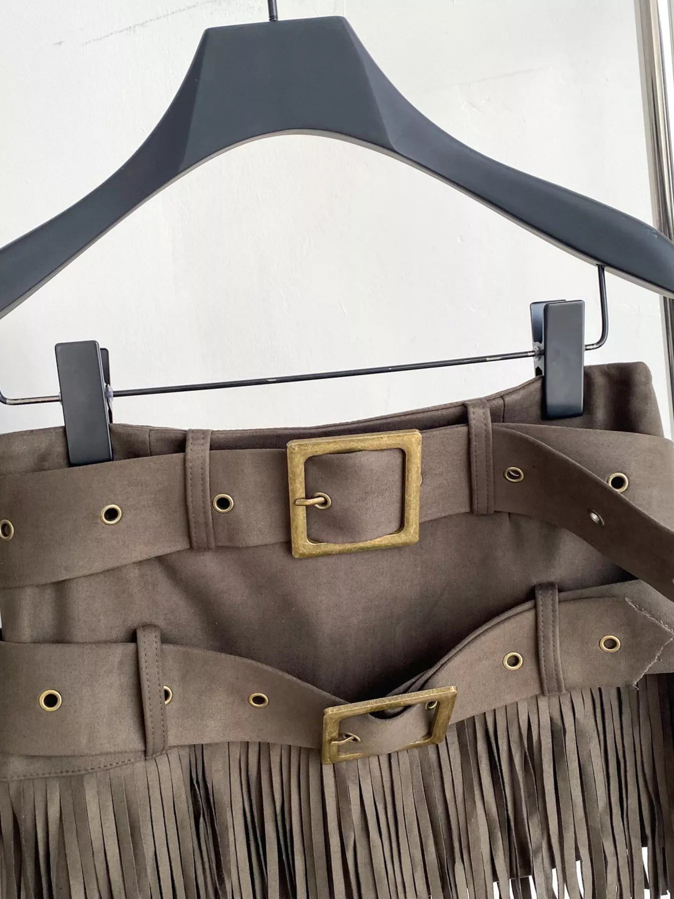 Fringe belted skirt three quarter view