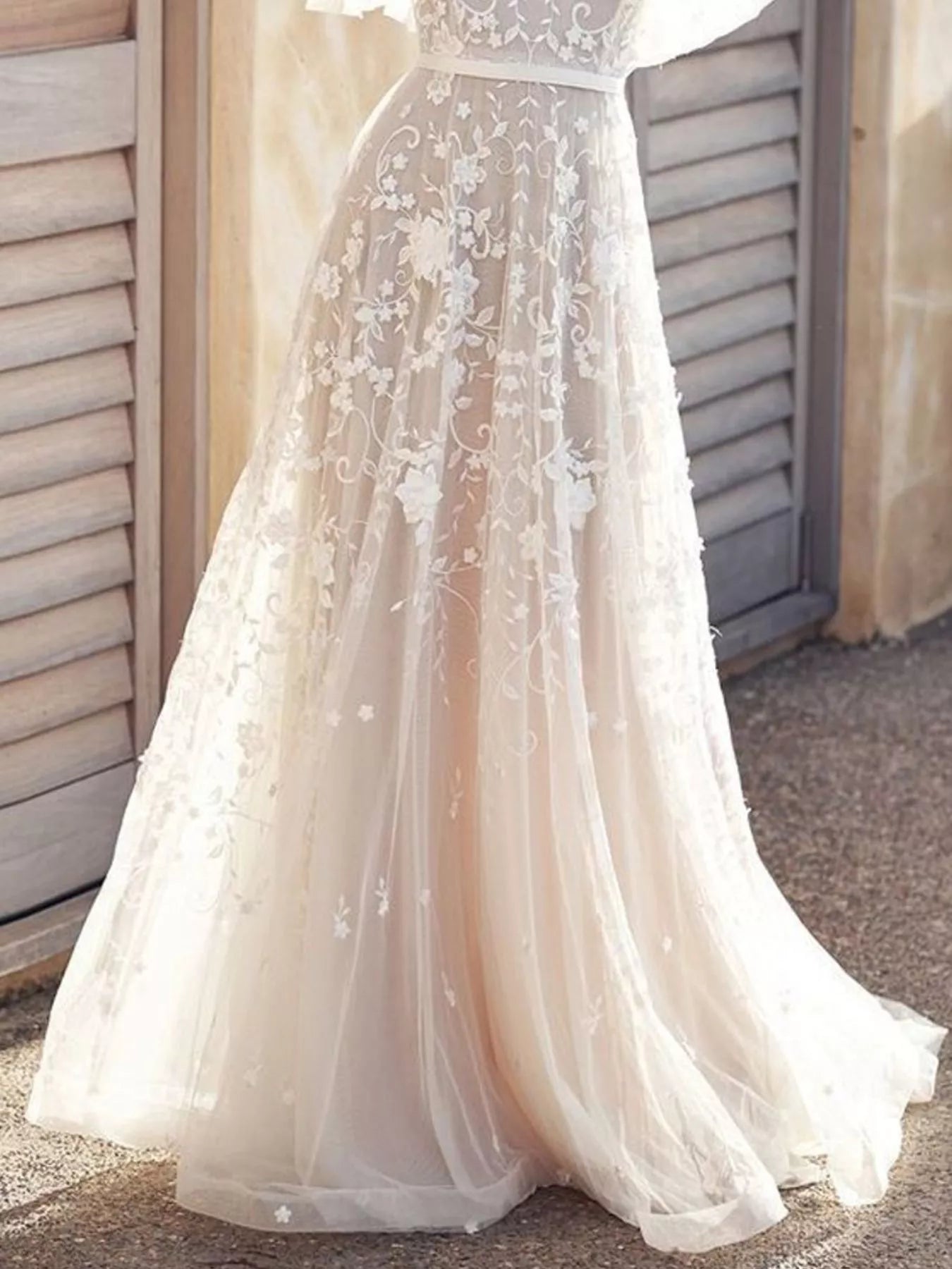 White lace flutter sleeve dress styled on model