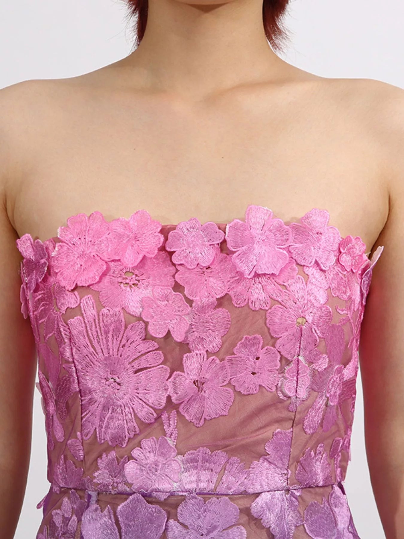 Floral embroidered maxi dress styled for a summer event