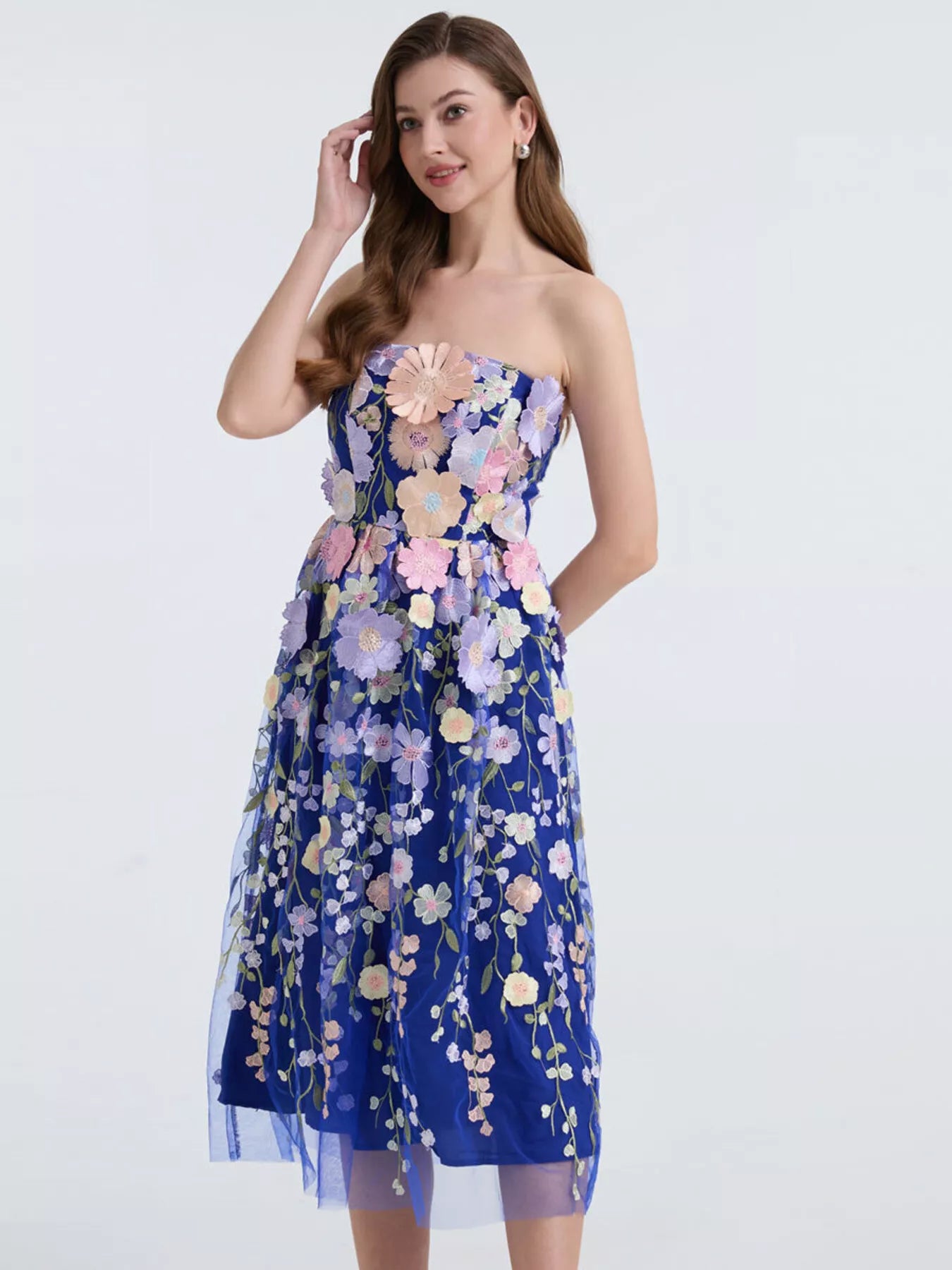 Strapless midi dress worn with heels