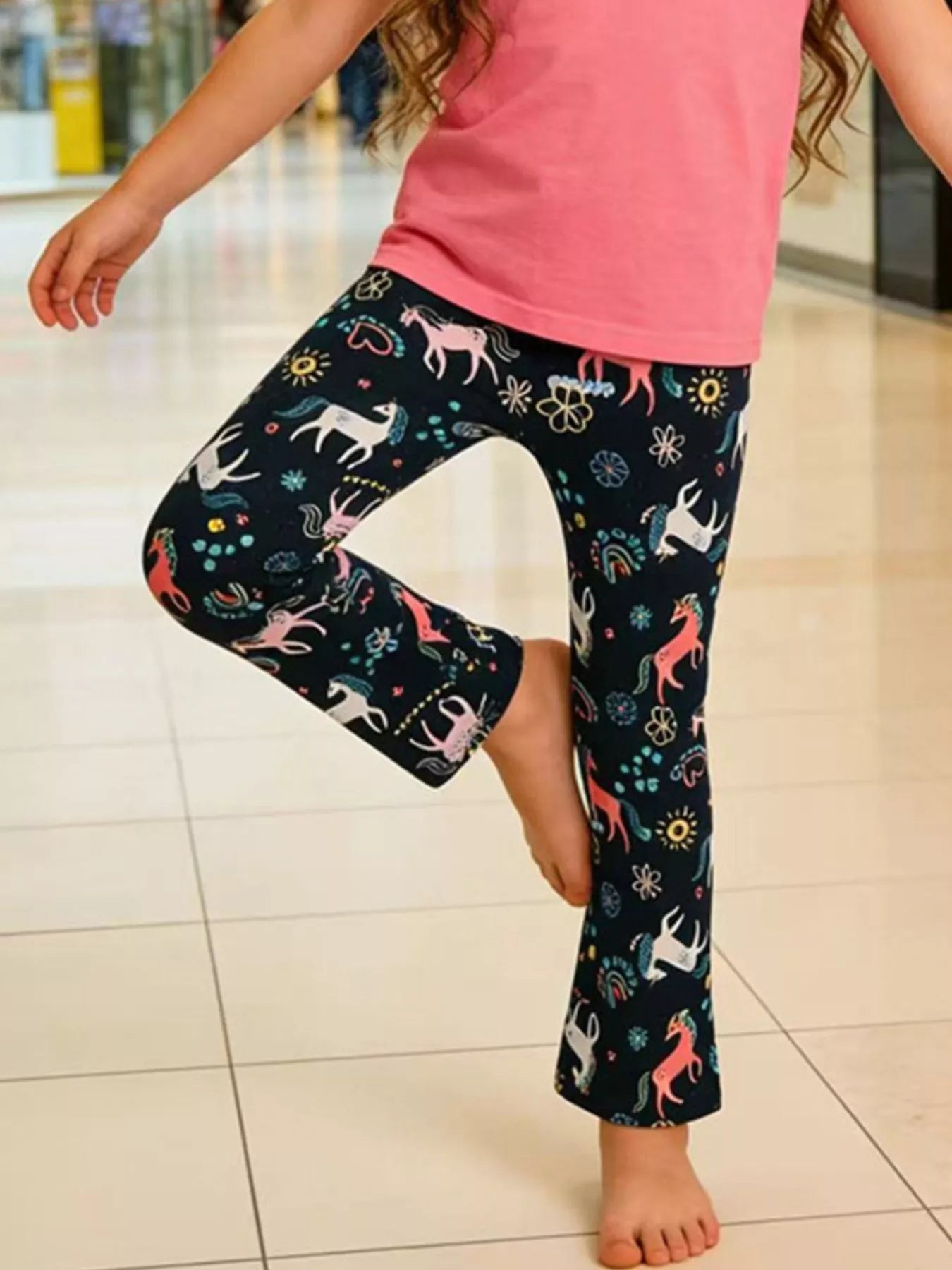 Girls unicorn print flare leggings front view