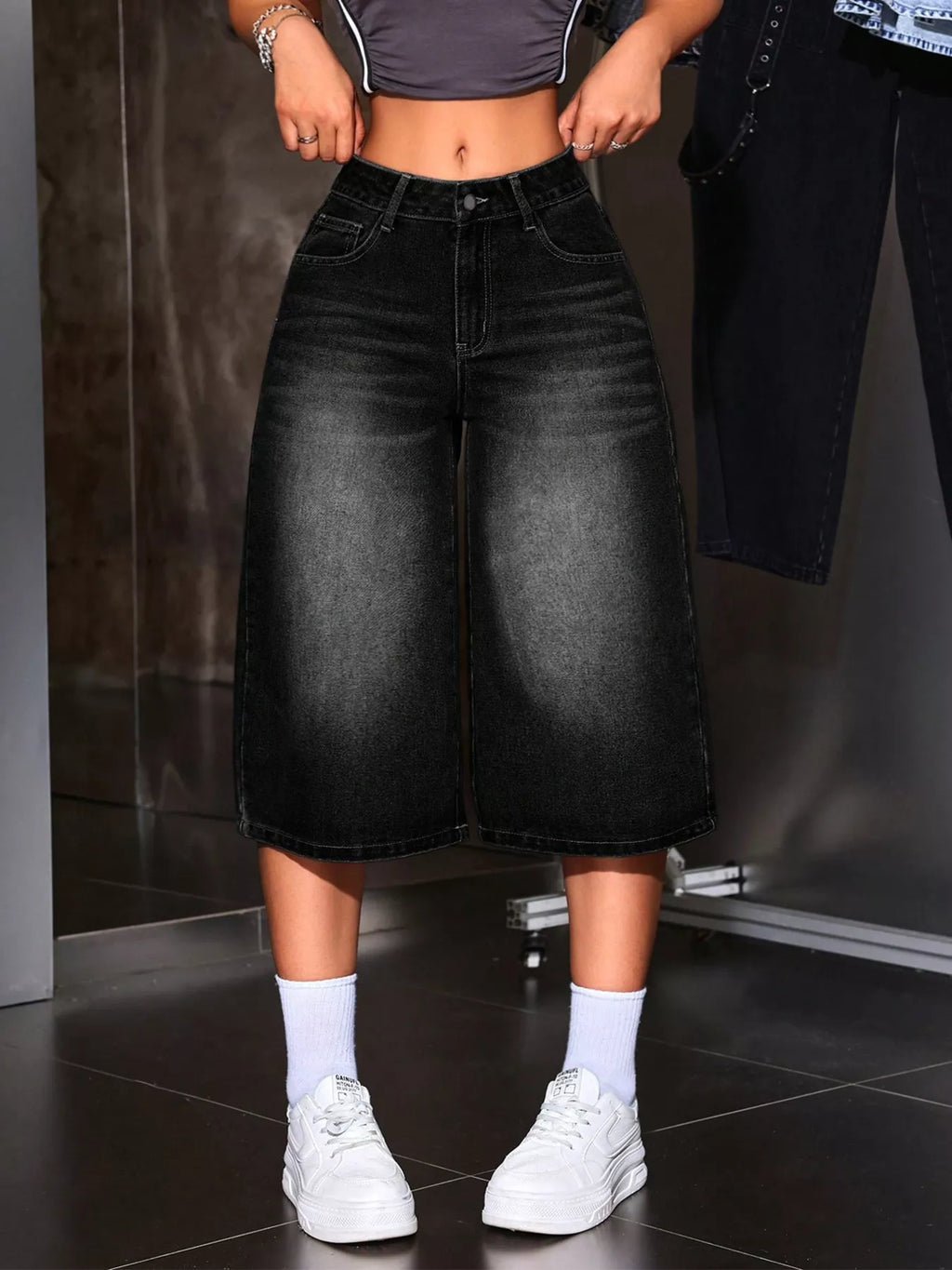 Black wide leg denim capri jeans front view on model