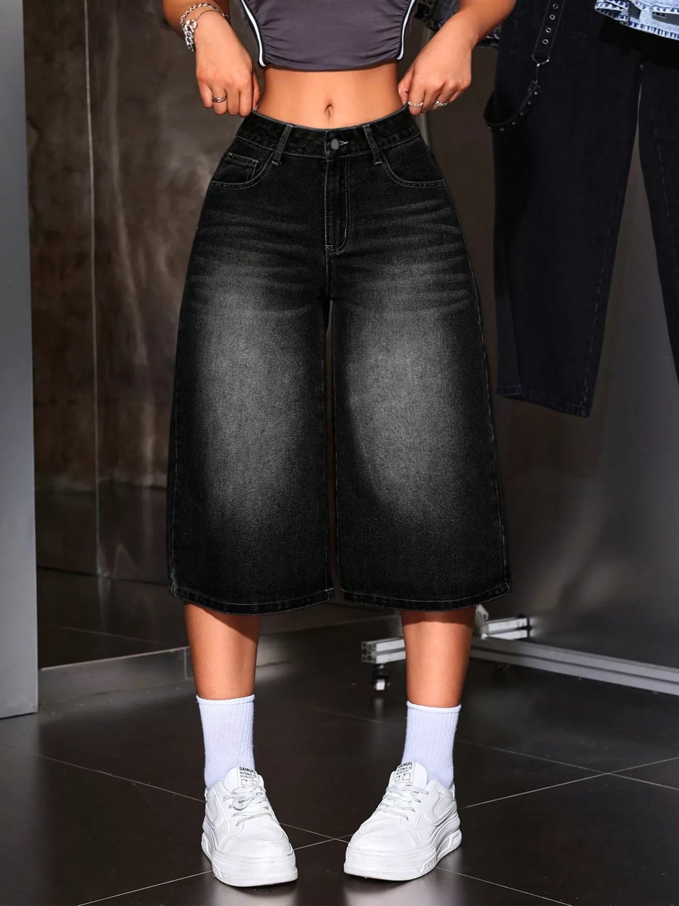 Black wide leg denim capri jeans front view on model
