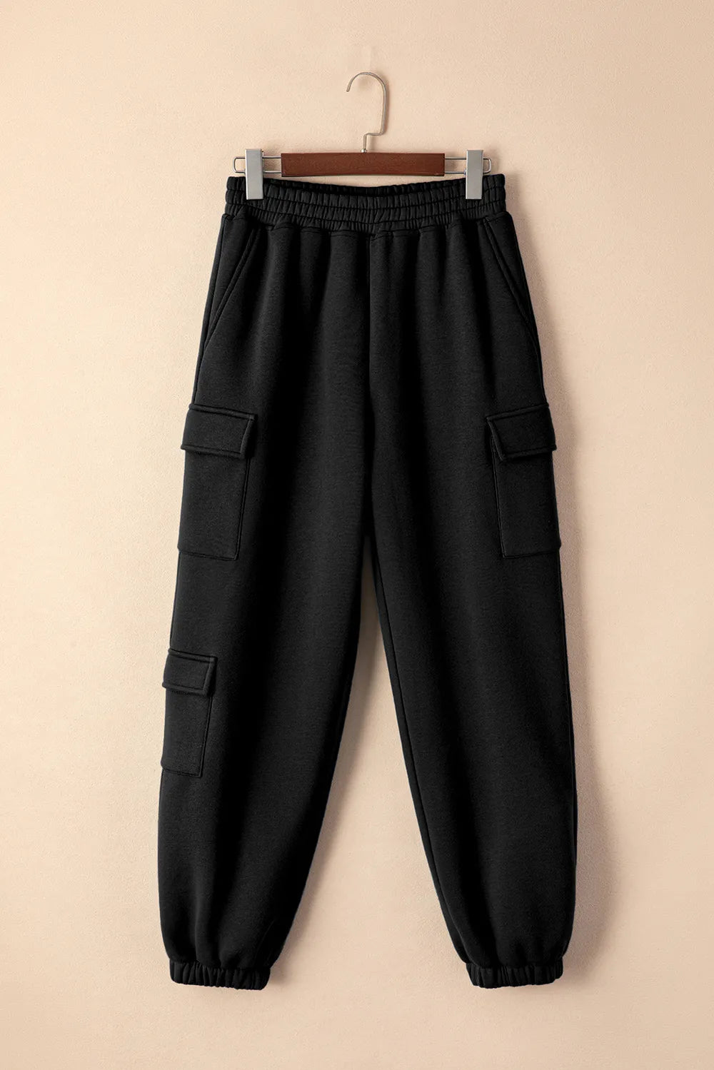 Pocket detail on black jogger pants