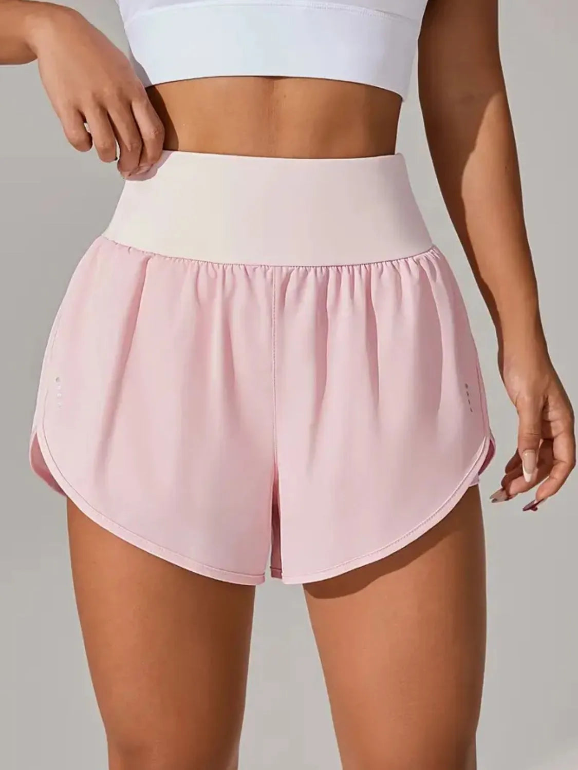 Plum purple high waist active shorts on model