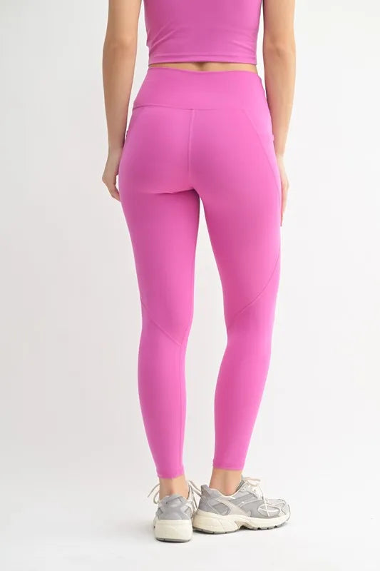 Orchid buttery soft leggings back view on model