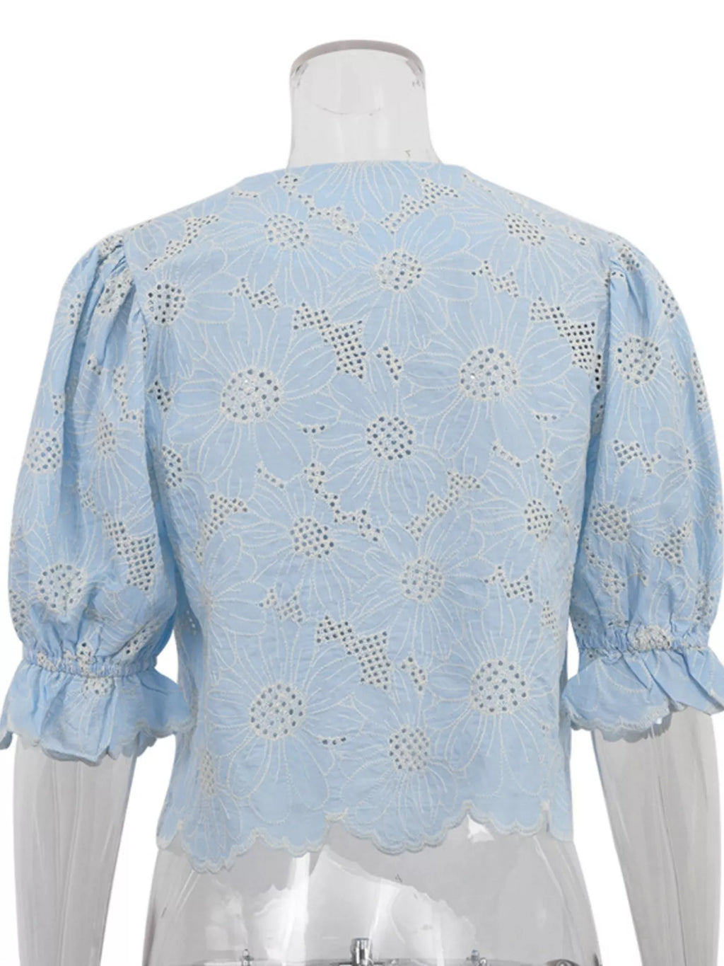 Embroidered flounce sleeve top styled look