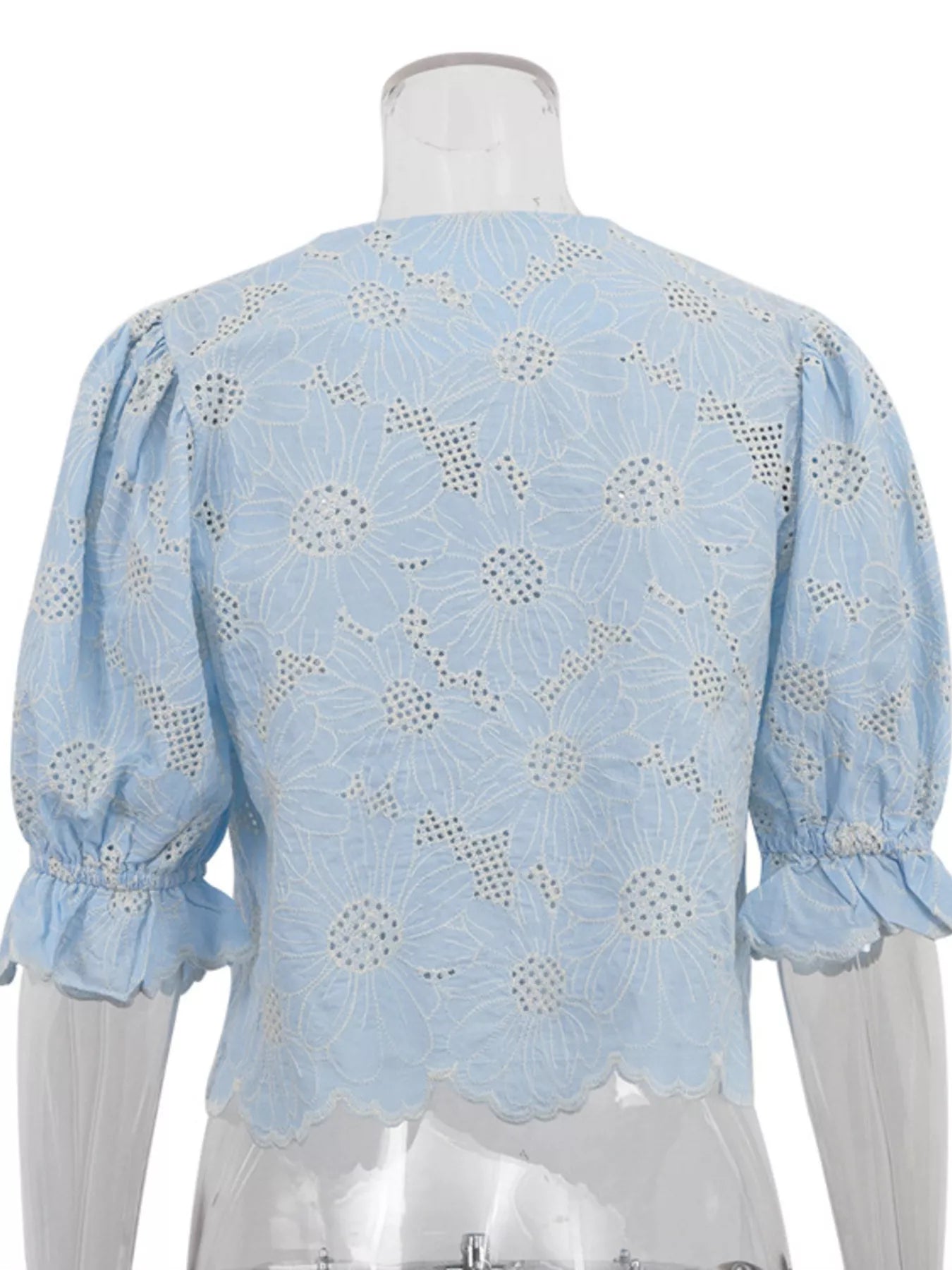 Embroidered flounce sleeve top styled look
