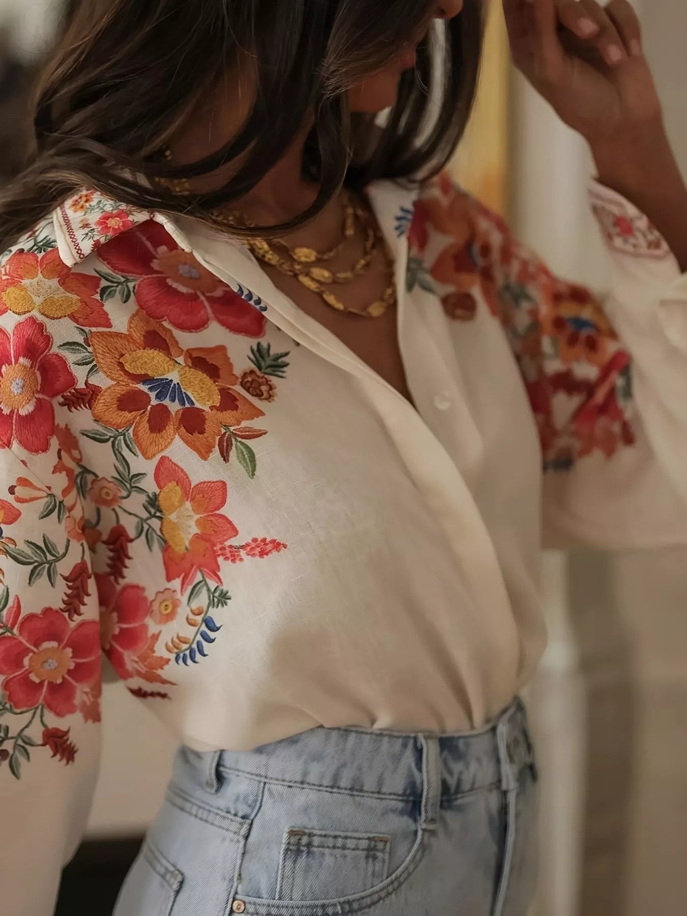 Floral button up shirt side view on model