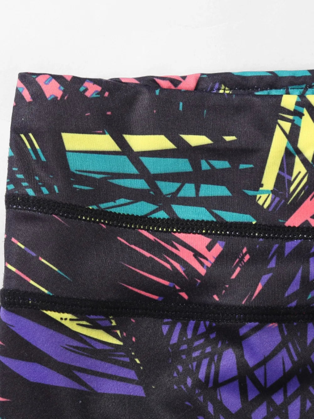 Stirrup hem detail on printed active leggings