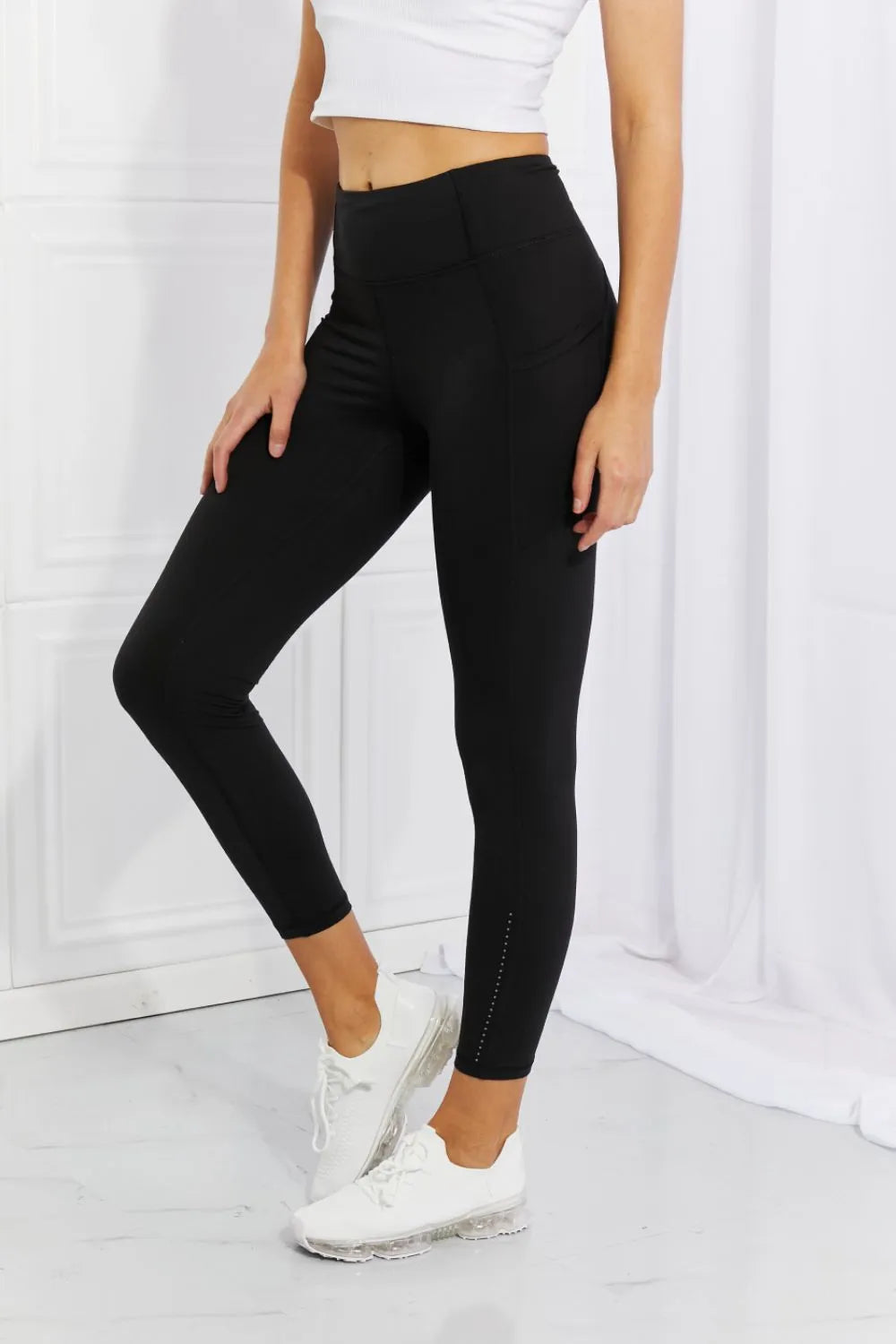 Active leggings with side pockets on model